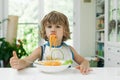 Boy eating pasta Royalty Free Stock Photo