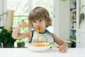 Boy eating pasta Royalty Free Stock Photo