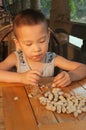 Boy eating peanuts