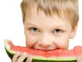 Boy eating a piece of watermelon Royalty Free Stock Photo