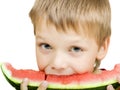 Boy eating a piece of watermelon Royalty Free Stock Photo