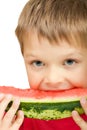 Boy eating a piece of watermelon Royalty Free Stock Photo