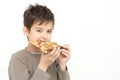 A boy eating pizza