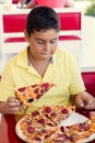 Boy Is Eating Pizza
