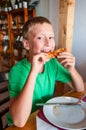 Boy eating pizza Royalty Free Stock Photo