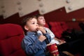 Boy eating popcorn Royalty Free Stock Photo