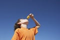Boy Eating Popsicle Against Blue Sky Royalty Free Stock Photo