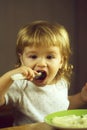Boy eating porridge Royalty Free Stock Photo