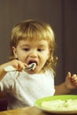 Boy eating porridge Royalty Free Stock Photo