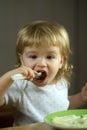 Boy eating porridge Royalty Free Stock Photo