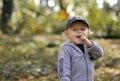 Boy eating pretzel stick