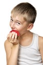 Boy eating red apple Royalty Free Stock Photo