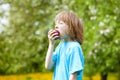 Boy Eating Red Apple Royalty Free Stock Photo