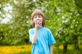 Boy Eating Red Apple Royalty Free Stock Photo