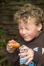 Boy eating Sour Grapefruit
