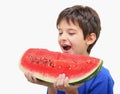 A boy eating watermelon