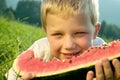 Boy eating watermelon Royalty Free Stock Photo