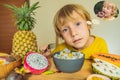 Boy eats fruit but dreams about donuts. Harmful and healthy food for children. Child eating healthy snack. Vegetarian Royalty Free Stock Photo