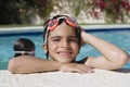 Boy At The Edge Of Swimming Pool Royalty Free Stock Photo