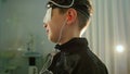 Boy with electrodes on the head looking to monitor - healthcare children`s diagnostic - Ophthalmology researching
