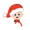 Boy with emotions panic, surprised face, shocked eyes in red Santa hat