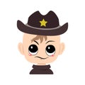 Boy with emotions of suspicious, displeased eyes in sheriff hat with yellow star Royalty Free Stock Photo