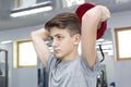 Boy engaged in the gym hall Royalty Free Stock Photo