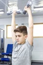 Boy engaged in the gym hall Royalty Free Stock Photo