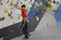 The boy is engaged in rock climbing, active recreation Royalty Free Stock Photo