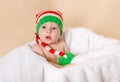 Boy enjoy the holiday. Happy toddler. Funny baby is wearing an elf Royalty Free Stock Photo