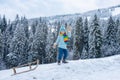 Boy enjoy a sleigh ride. Child sledding, riding a sledge. Children play in snow in winter. Outdoor kids fun for Royalty Free Stock Photo