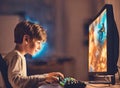 A young boy engrossed in a computer game