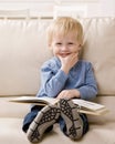 Boy enjoying reading a book