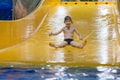 Boy enjoying water slide Royalty Free Stock Photo