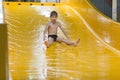 Boy enjoying water slide Royalty Free Stock Photo