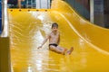 Boy enjoying water slide Royalty Free Stock Photo