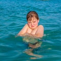 Boy enjoys the clear warm water Royalty Free Stock Photo