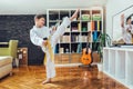 Boy exercising at home in living room Royalty Free Stock Photo