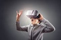 Boy experiencing using a virtual reality headset Royalty Free Stock Photo