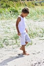 Boy exploring beach