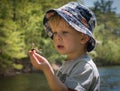 Boy Exploring Nature Finds a Dragonfly