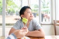 Boy with expression of disgust against vegetables Royalty Free Stock Photo