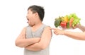 Boy with expression of disgust against vegetables Royalty Free Stock Photo