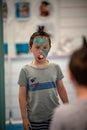 Boy with face painted like a shark Royalty Free Stock Photo