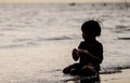 Boy facing out the sea on a Vacation Beach holidays silhouett