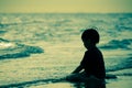 Boy facing out to the sea on Vacation Beach holidays silhouett