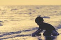 Boy facing out to the sea on a Vacation holidays silhouette