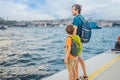 Boy and father tourists enjoying Galataport area view, cruise port of Istanbul newly opening in 2021, located in the