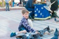 The boy feeds the pigeons Royalty Free Stock Photo