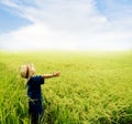 Boy feel good on rice field